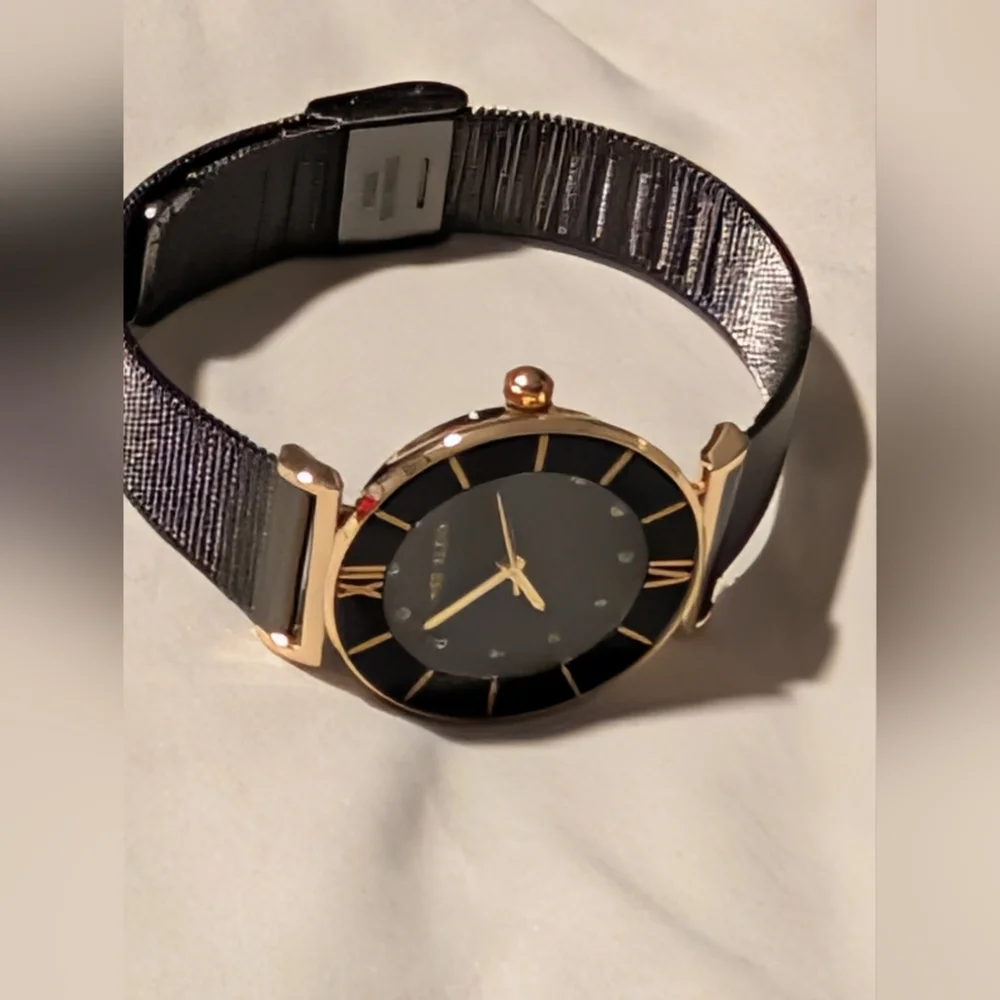Anne Klein Gold and Black Round Dial Crystal Accent Watch